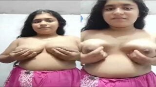 Topless Indian girl playing with her huge boobs