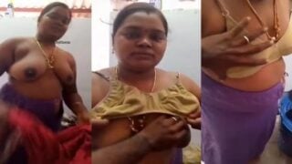 Housewife wearing bra and boob press by husband