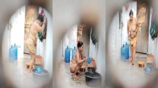 Telugu aunty outdoor bath peeped through small hole